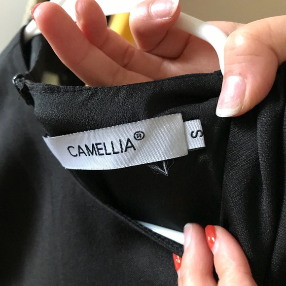 black jumpsuit with hollow out at the waist. - Picture 3 of 3